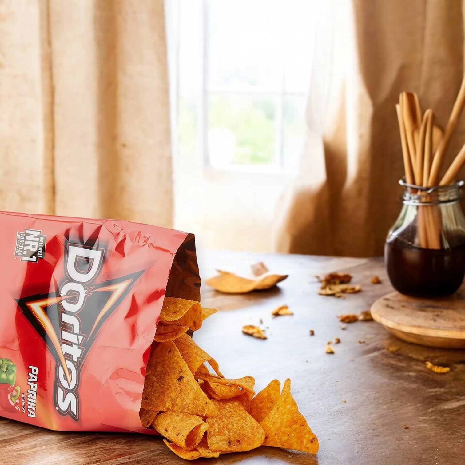 An opened bag of Frito Lay's Doritos Nacho Cheese 1 oz - 1 Count is spilling onto a wooden table with breadsticks and a jar in the background, making it perfect for on-the-go snacking.