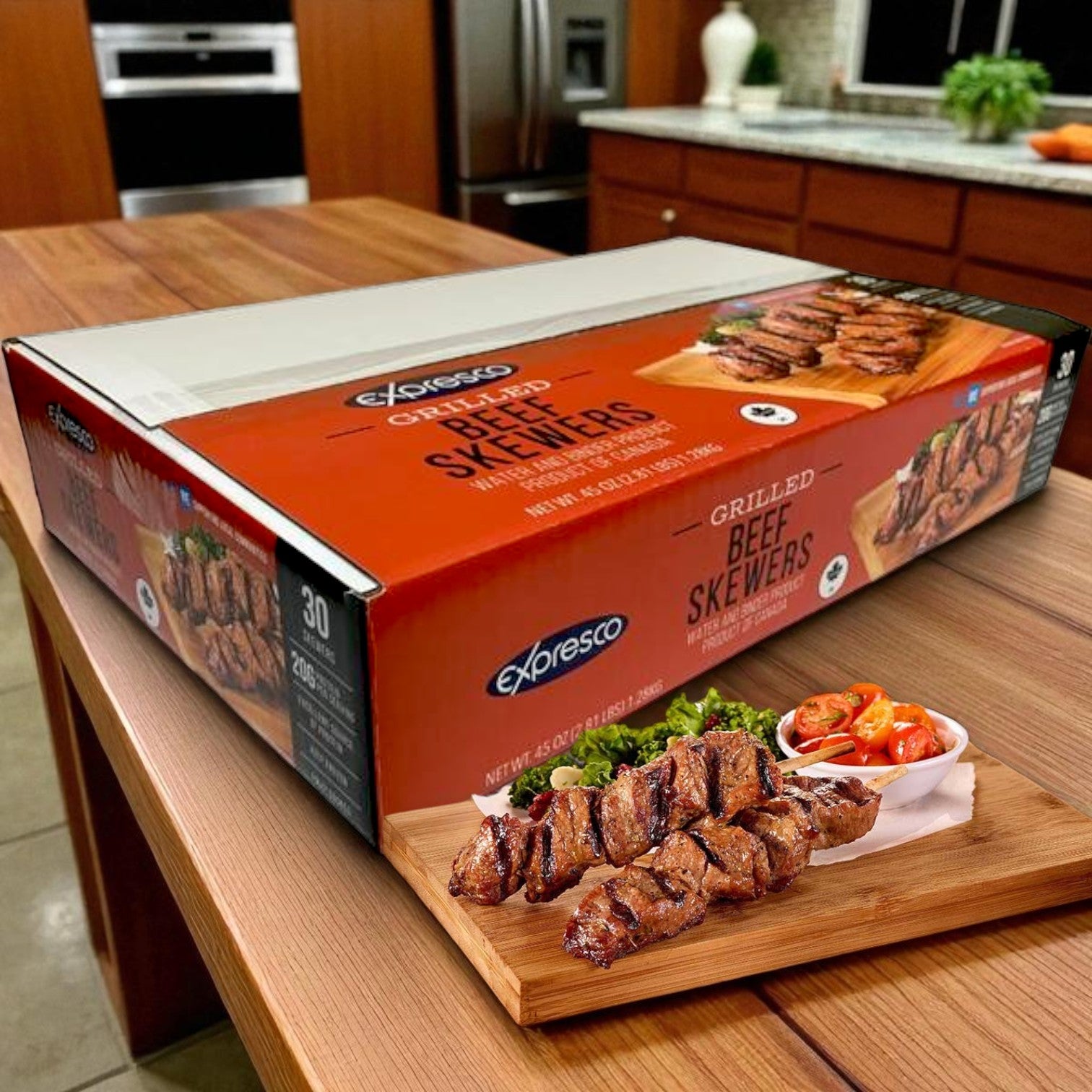 A 30-count box of Gordon Choice Expresco Grilled Beef Skewers sits on the counter, with cooked skewers, sauce, and veggies on display—perfect with Expresco Chicken Skewers for a high-protein snack.