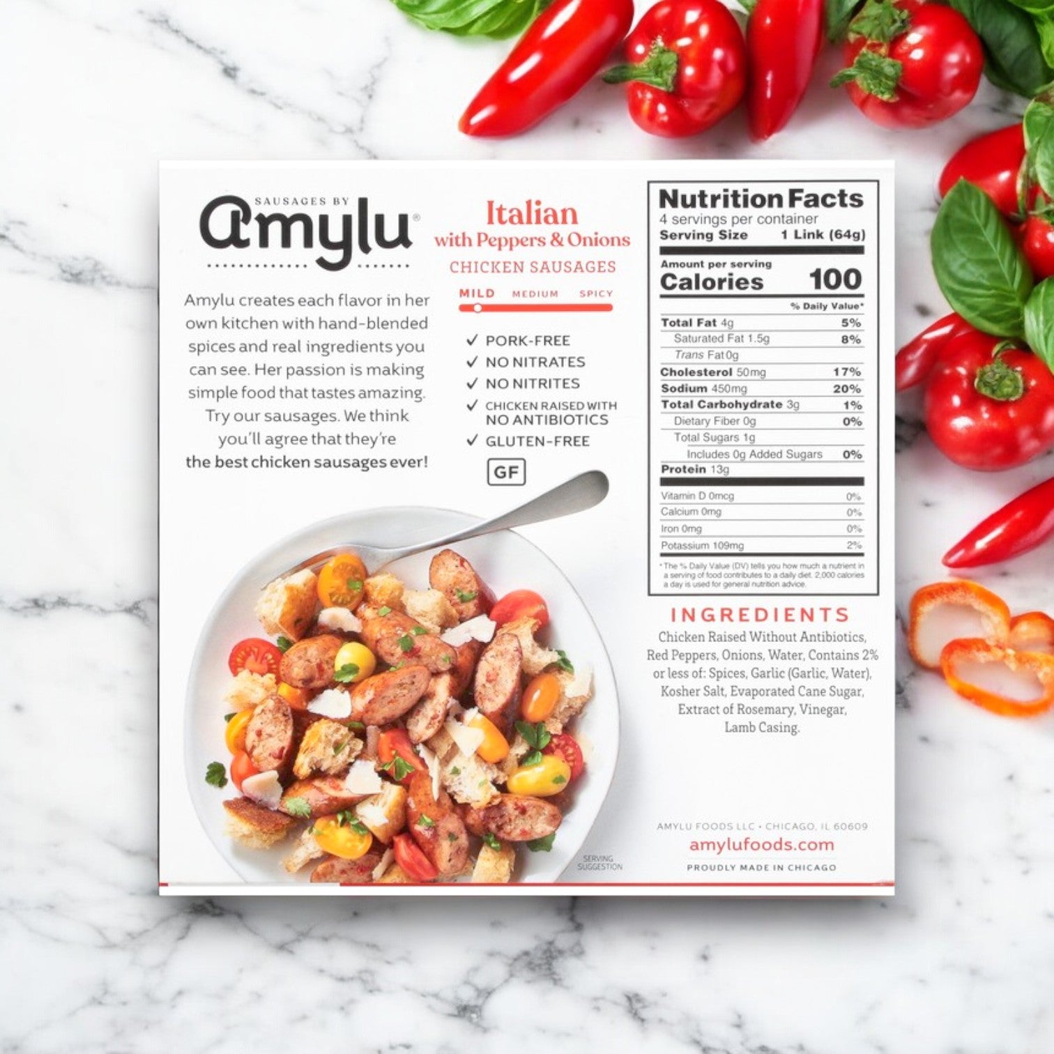 Easy Lunches Amylu Italian Chicken Sausage with Peppers & Onions – 3 Packs are displayed on a marble surface, featuring nutrition facts, ingredients, product details, and a plated serving suggestion.