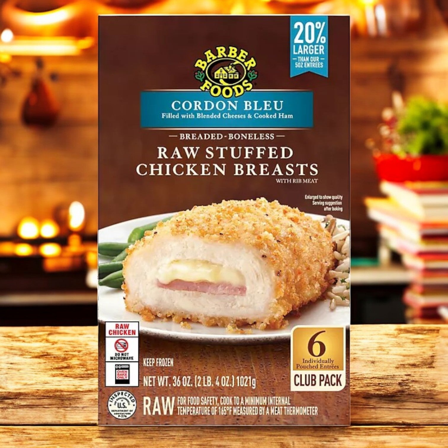 A box of Sam's Club Barber Foods Cordon Bleu Stuffed Breaded Chicken Breasts, featuring 6 individually wrapped pieces, is displayed on a wooden table with an image of savory stuffing-filled chicken breasts, making it a convenient meal option for any occasion.