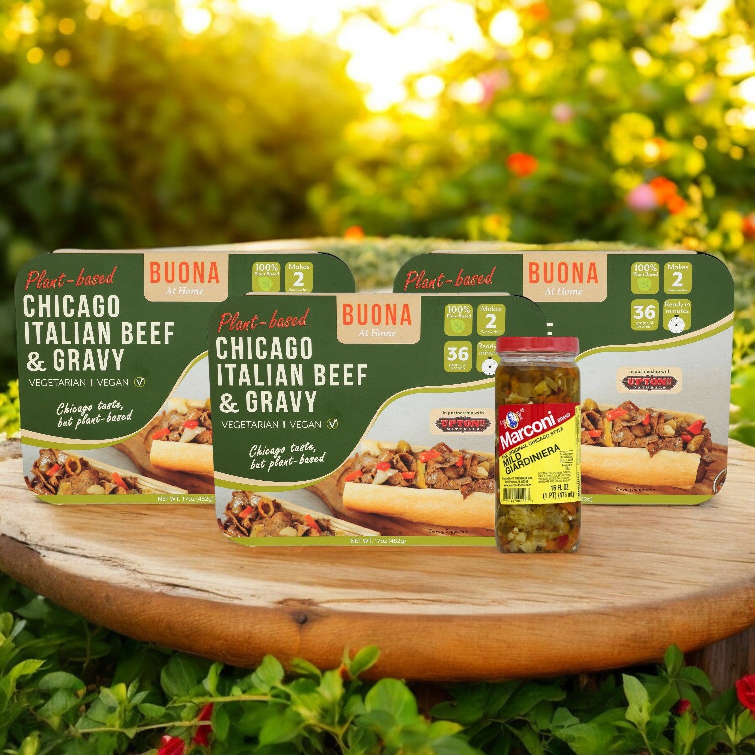 Buona Kit Combo! by Easy Lunches brings classic Chicago flavors to plant-based innovation with Italian Beef Sandwich Entrées. Presented on a wooden outdoor surface, each package includes a jar of Marconi giardiniera, capturing an iconic culinary essence.