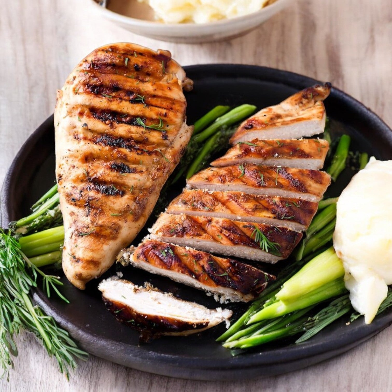 Enjoy Mino Prime Steaks’ all-natural chicken breasts, grilled to perfection and paired with green asparagus and creamy mashed potatoes, topped with fresh herbs. A perfectly balanced, high-protein meal.