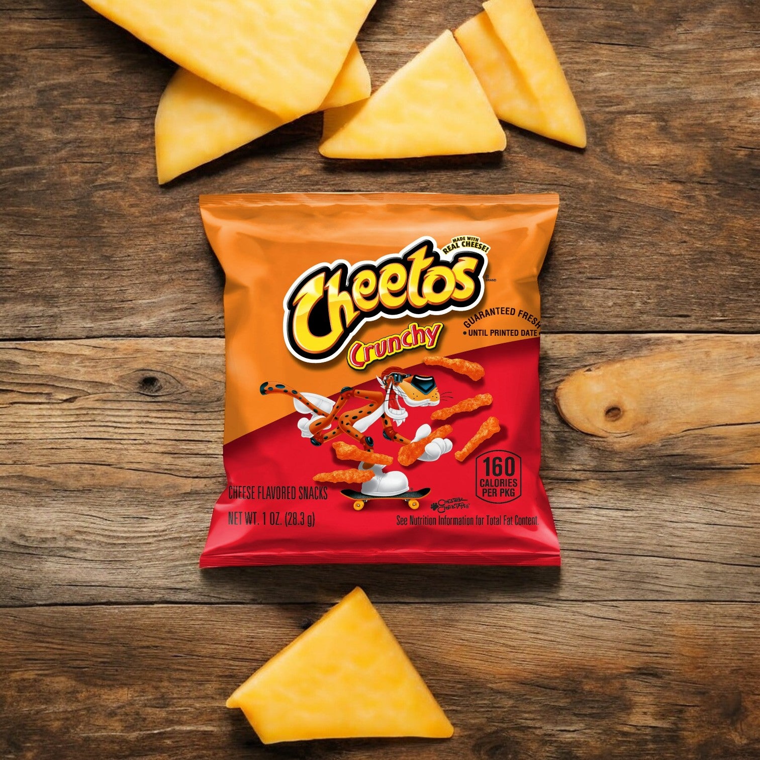 A 1 oz bag of Cheetos Cheese Chips from PepsiCo rests on a wooden surface surrounded by several pieces of real cheese. The orange bag features the iconic Cheetos logo along with an image of the crunchy snack.