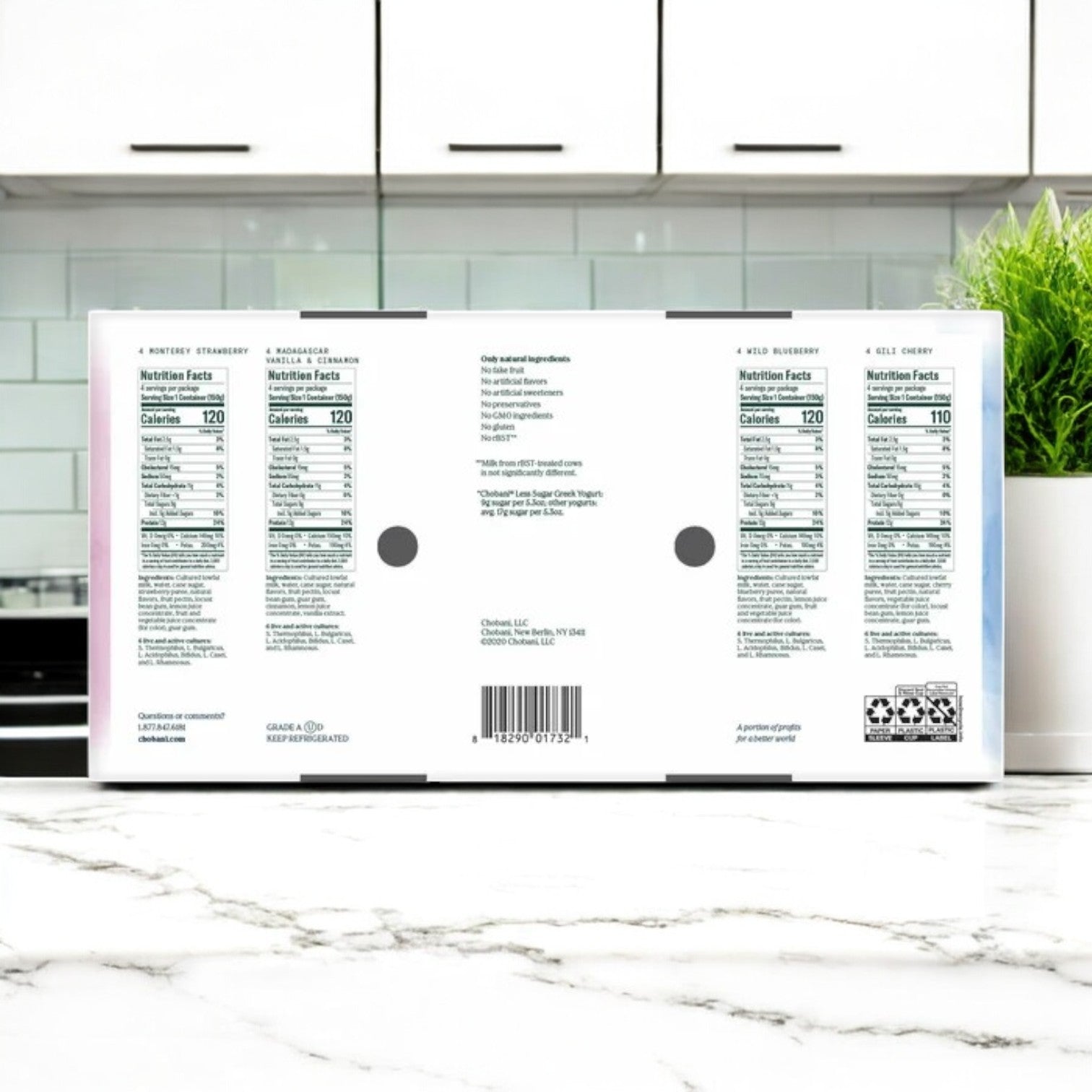 A cereal box with nutritional panels is on the kitchen counter next to a Chobani Less Sugar Greek Yogurt Pack, providing a high-protein, reduced-sugar option for your morning routine.