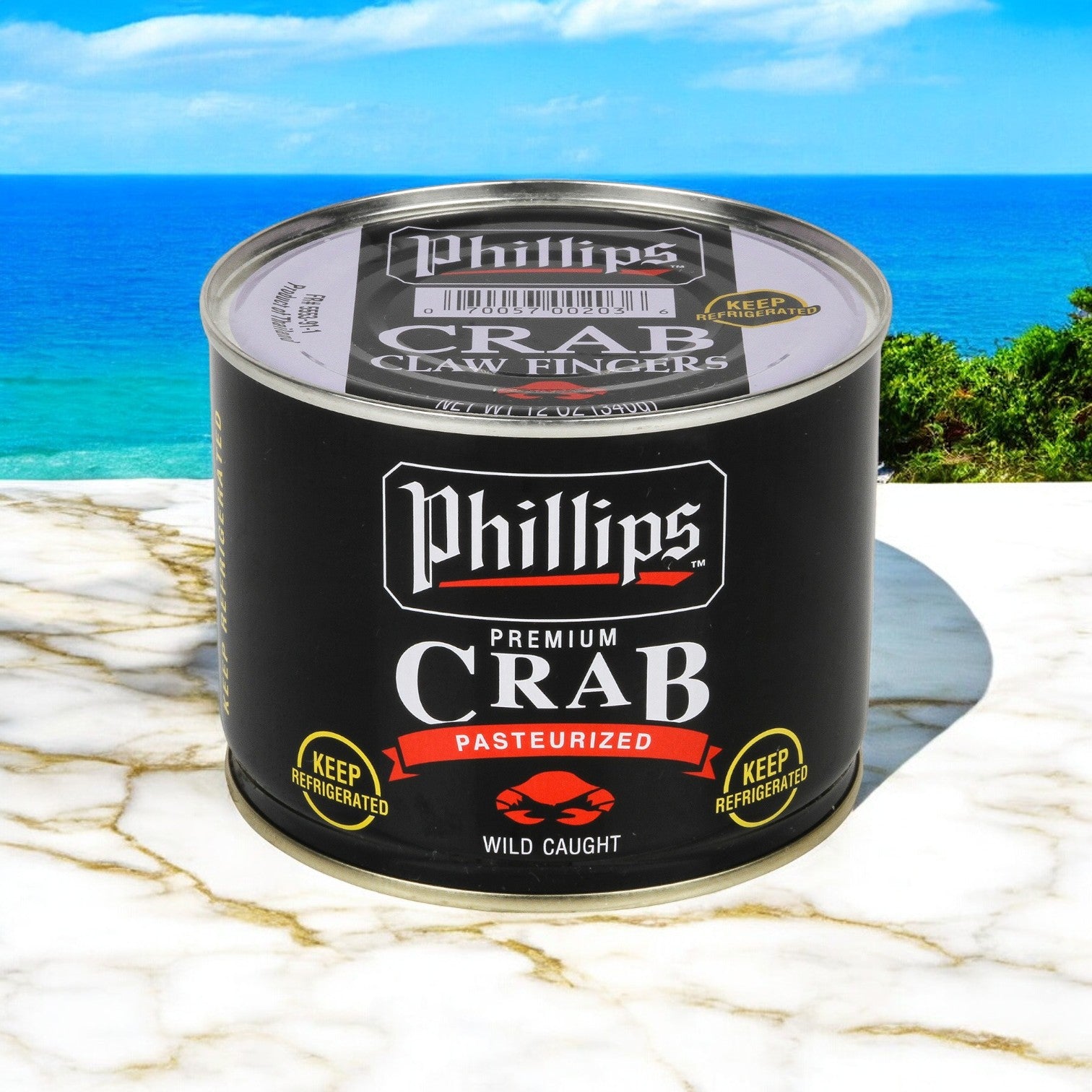 A can of Phillip Foods Crab Claw Finger Pasteurized Asia, featuring a black label, sits on a marble surface against an outdoor backdrop filled with greenery and sky, delivering authentic flavors ideal for crafting versatile appetizers.