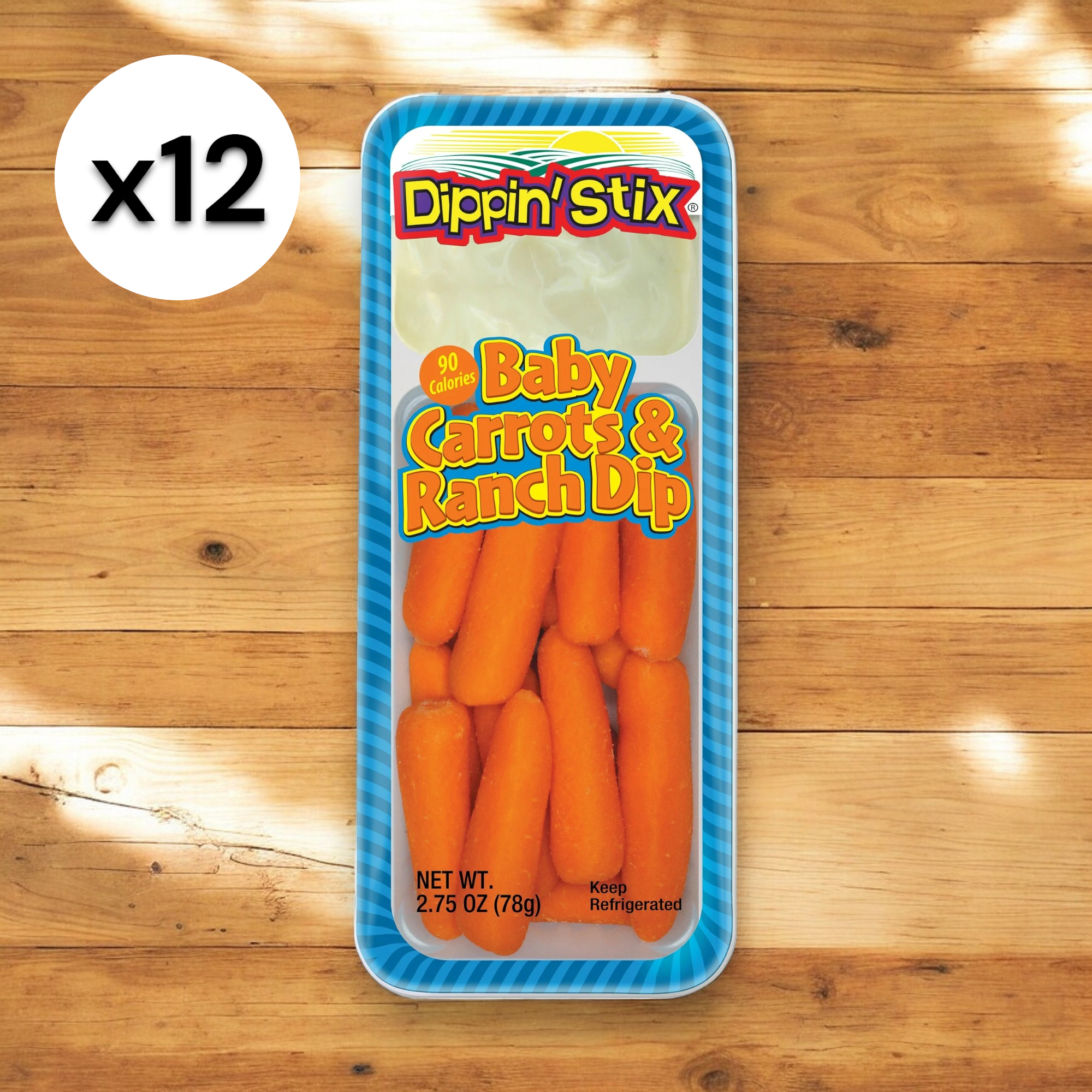 A collection of 12 packs of Easy Lunches' Baby Carrots & Ranch Dip Dippn' Stix!, each with a net weight of 2.75 oz (78g), placed on a wooden surface. The packaging indicates 90 calories per pack and instructs to keep refrigerated for this healthy snack.