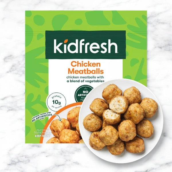 A box of Kidfresh Frozen Chicken Meatballs - 16.45 oz with a plate of cooked meatballs in front. The box highlights 10g of protein per serving, hidden veggies, and no artificial flavors or preservatives—making it a nutritious choice for kids.