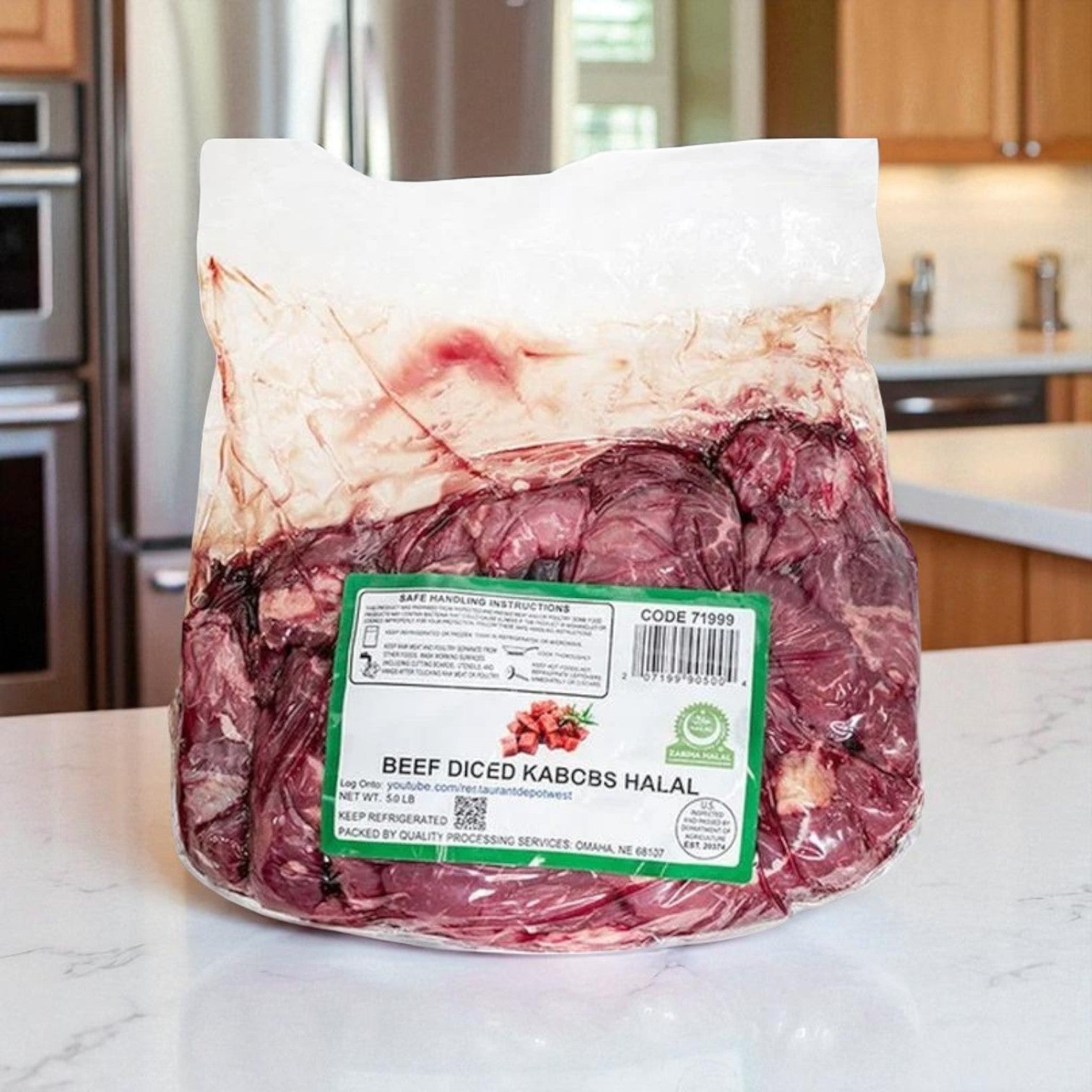 A sealed 5 lb bag of Restaurant Depot Halal Fresh Diced Beef Kabobs (1x1x2) rests on a kitchen counter beside a bulk case of boneless, skinless halal chicken breasts, both with green and white labels showing product details.