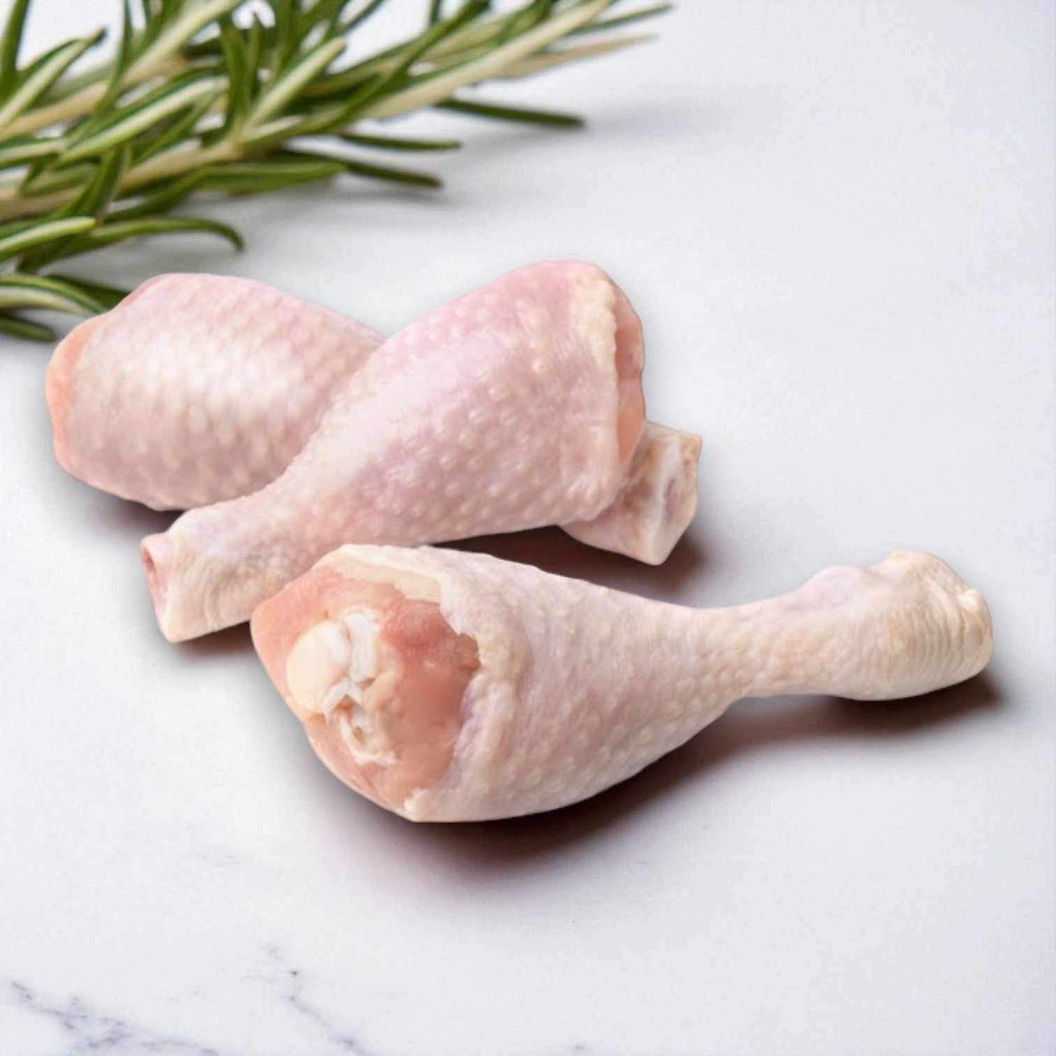 Halal Chicken Drumsticks – Approx. 40 lb Case from Restaurant Depot on a white marble surface—ideal for meal prep or diversifying your bulk chicken selection.
