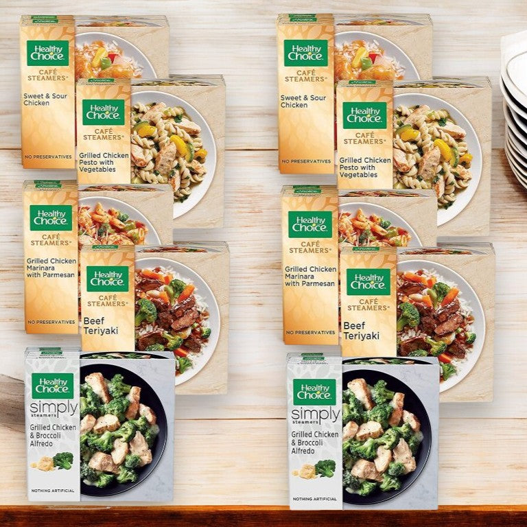 A display of Healthy Choice frozen meals on a wooden shelf, featuring the Healthy Choice Meals Bundle - 8 Meal Bundle. This assortment includes options like Sweet and Sour Chicken, Grilled Chicken Marinara with Parmesan, Beef Teriyaki, and Beef Merlot—perfect for quick lunches or dinners. Enjoy these nutritious meals anytime!