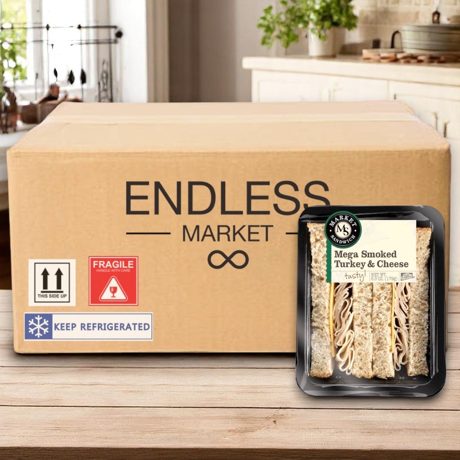 A cardboard box labeled "Endless Market" sits on a kitchen counter next to an E.A. Sween Mega Smoked Turkey & Cheese Sandwich Wedge (6.3 oz, individually wrapped), with snack chips nearby.