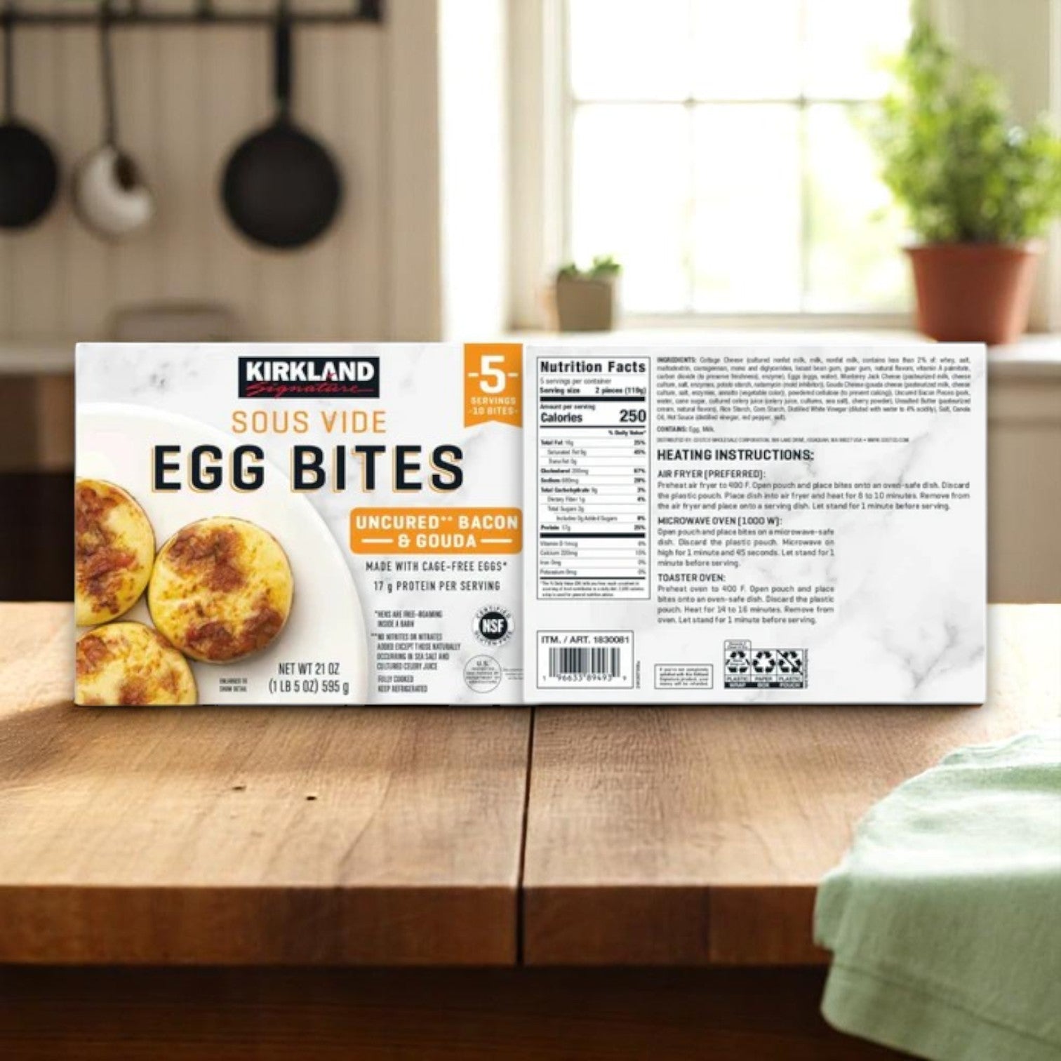 A Kirkland Signature Egg Bite Bundle – 20 Count from Kirkland Signature sits on a kitchen counter, with a softly blurred kitchen in the background.