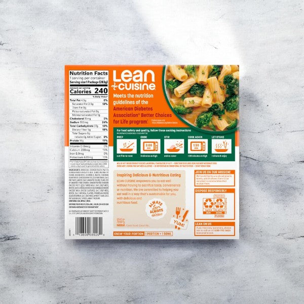 Back of a Lean Cuisine Macaroni and Cheese With Broccoli Bowl box featuring nutrition facts, cooking instructions for this microwaveable meal, and an image of the meal with cheese-covered macaroni and broccoli. The text emphasizes alignment with the American Diabetes Association's guidelines.