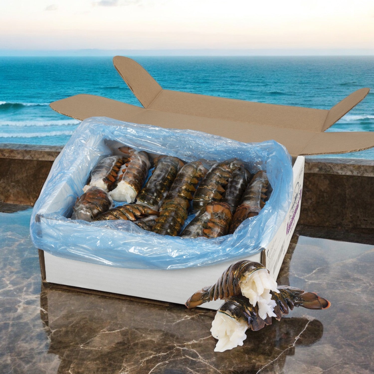 A box of Sysco Lobster Tail North Atlantic Premium sits on a marble table with an ocean view, ready to be grilled into your next culinary masterpiece.