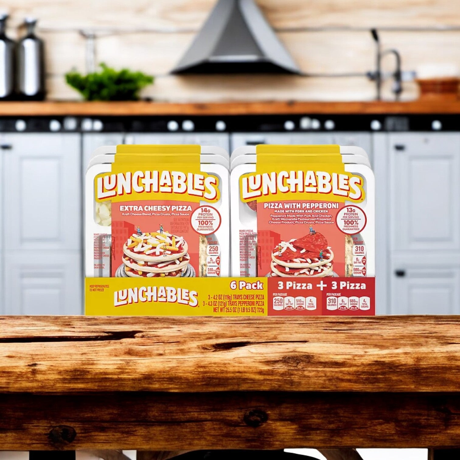 Two packs from the Lunchables 12 Pack, totaling 72 Lunchables, are displayed on a wooden table in a kitchen. One pack features Extra Cheesy Pizza, and the other offers Pizza with Pepperoni, each containing multiple individual servings.