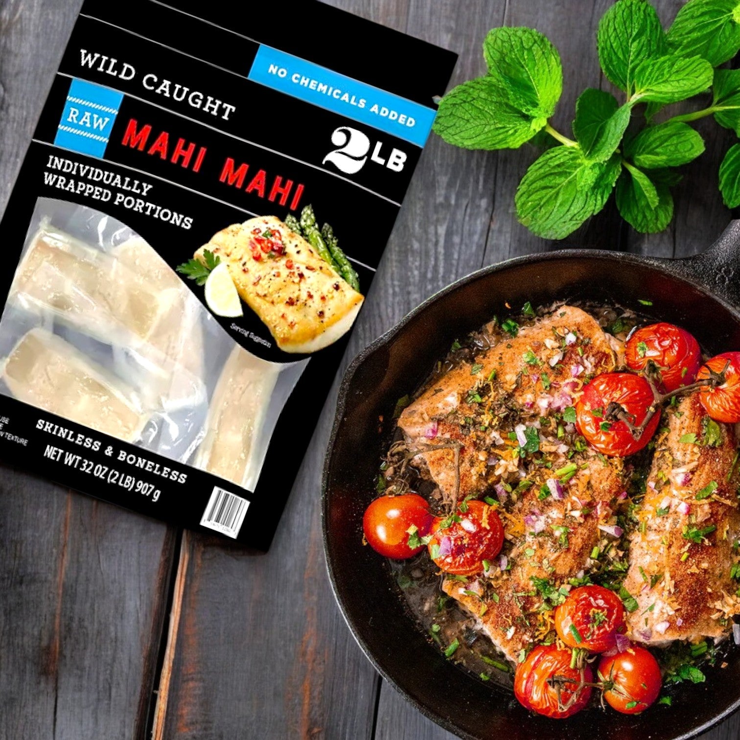 The Member's Mark Wild Caught Mahi Mahi Portions, 2 lbs. (frozen), are displayed next to a prepared dish of skinless and boneless fillets with cherry tomatoes and herbs.