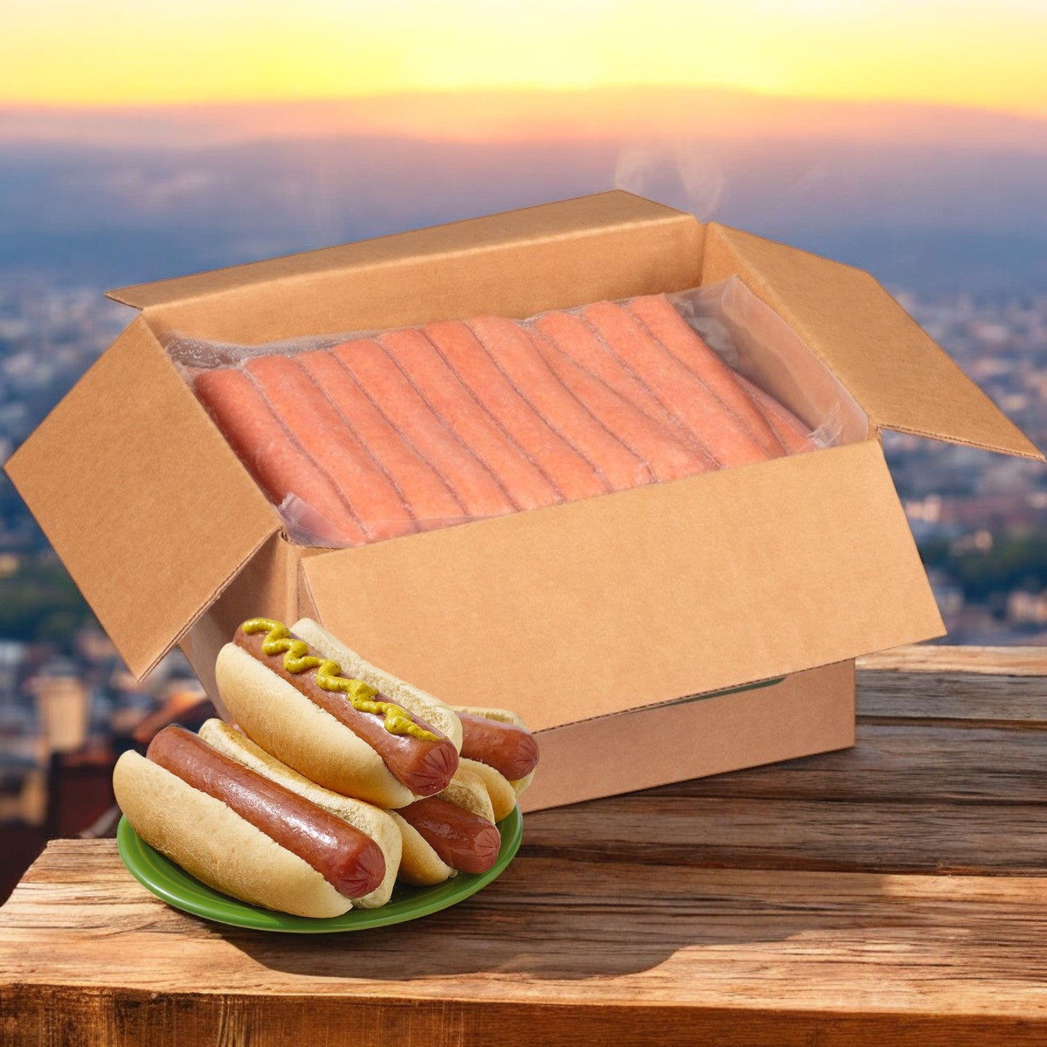 A box of Nathans Famous Frank All-Beef 6", 80 Count is beside a plate with three cooked franks in buns, one topped with mustard, on a wooden surface against a stunning city landscape backdrop.