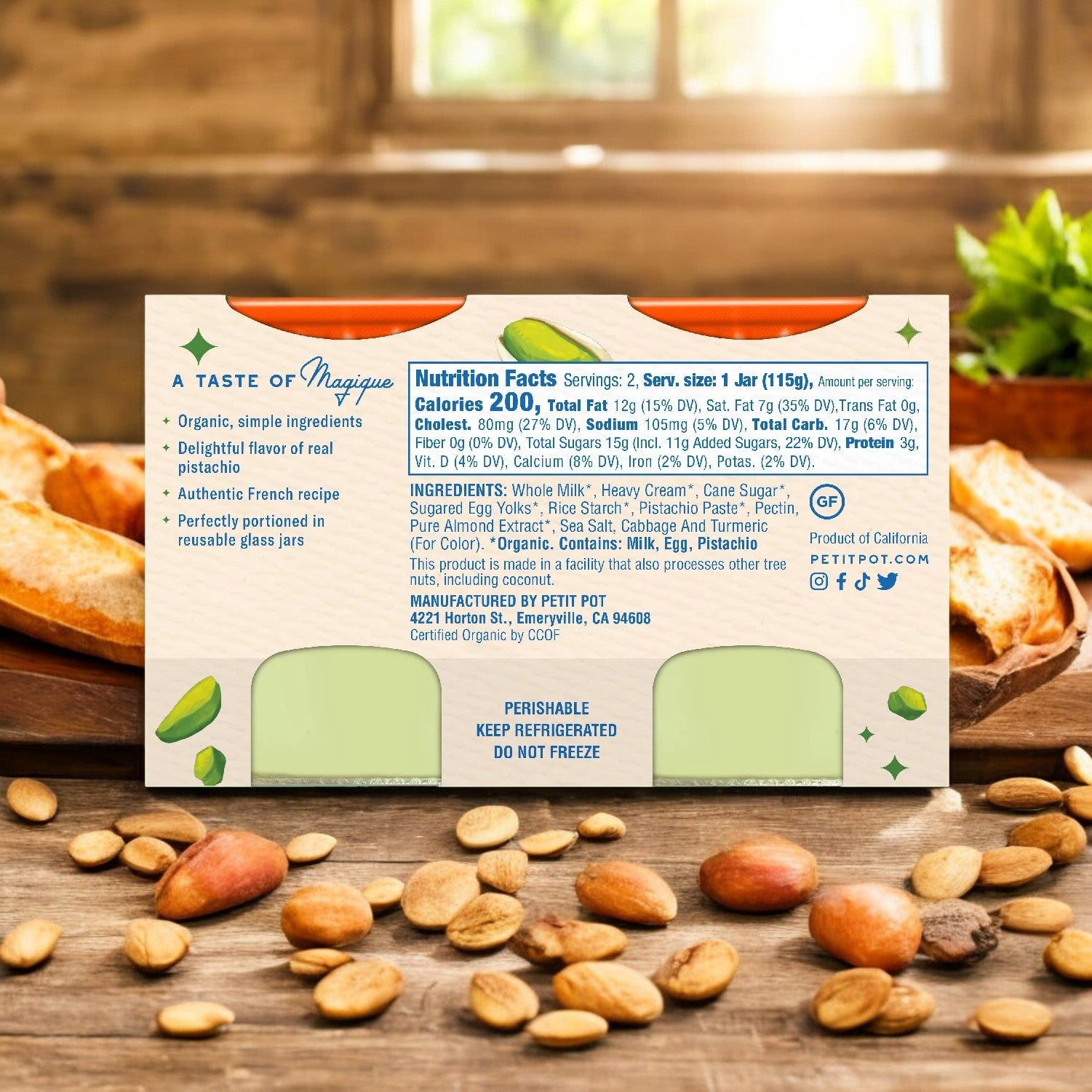 Label of a food product called "Pistachio Organic French Dessert - 2 Petit Pots" by Petit Pot, detailing ingredients, nutritional facts, and storage instructions. The label is surrounded by pistachios and bread slices on a wooden surface, reminiscent of an artisanal French cuisine presentation.