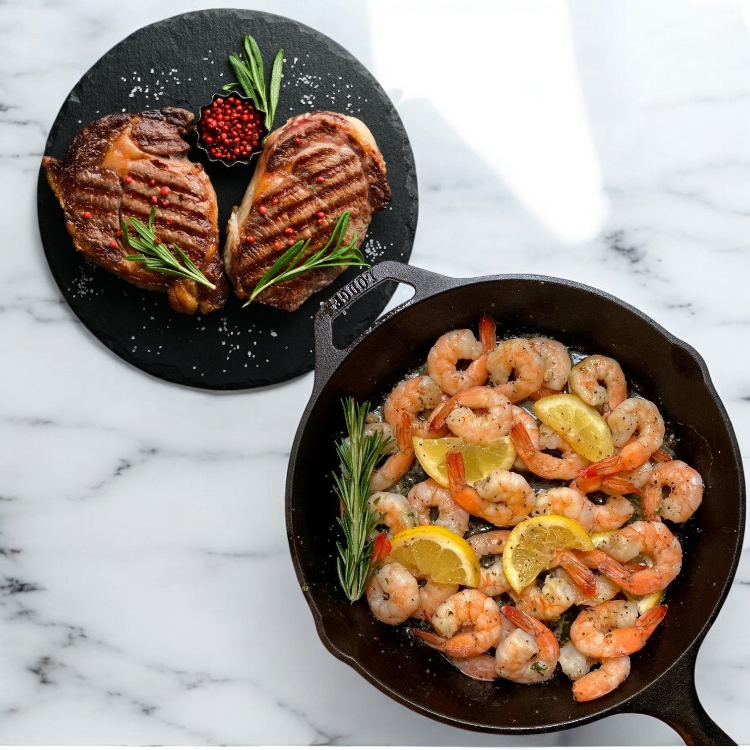 Experience the delectable Surf & Turf Combo by Easy Lunches, featuring a grilled Kirkland Signature USDA Prime Beef Boneless Ribeye Steak served on a round black platter with red garnish. Accompany it with sautéed farm-raised raw shrimp, enhanced with lemon slices and rosemary, all presented in a black skillet on a marble surface. Enjoy free shipping on this 2 lbs package!