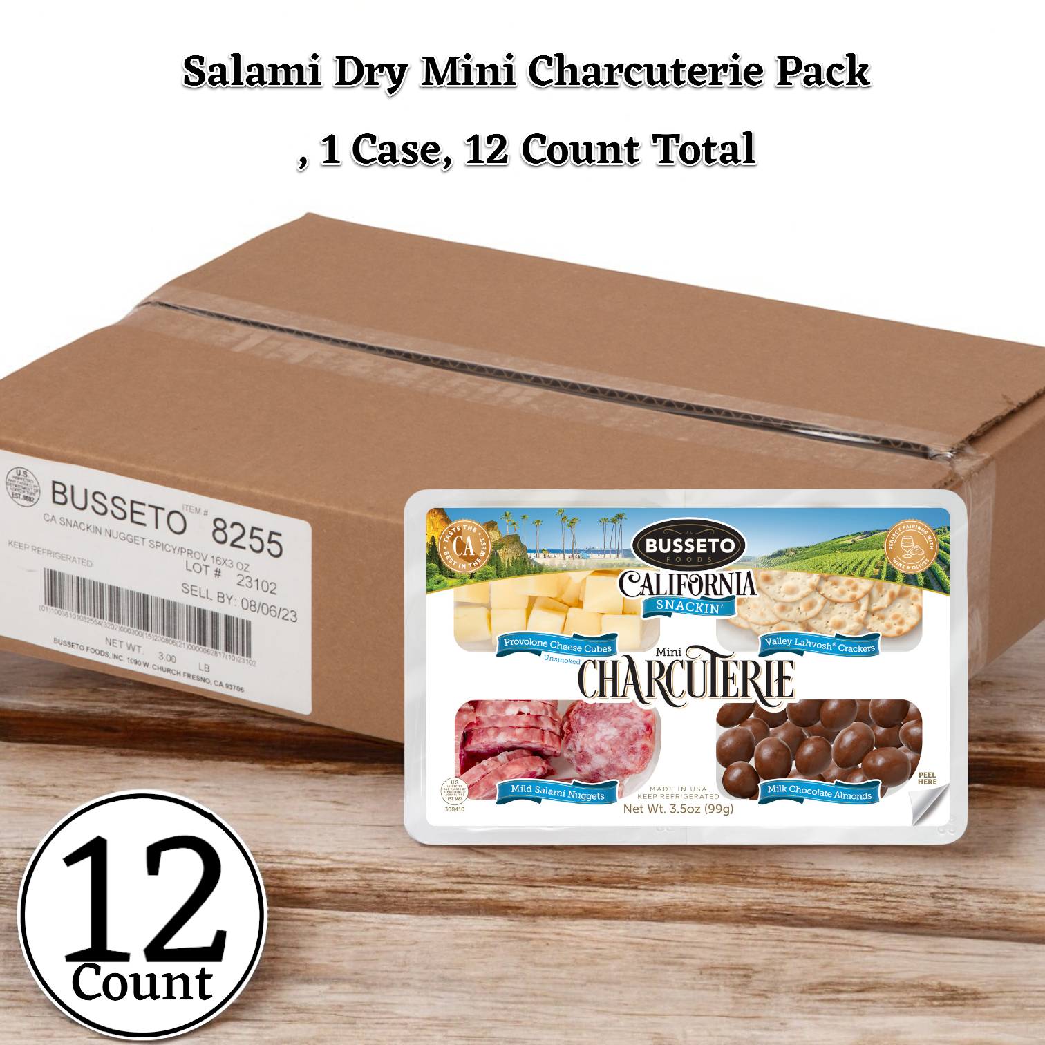 A cardboard box labeled "Busseto Salami Dry Mini Charcuterie Pack" sits open, revealing a case containing Artisanal Charcuterie by Busseto. The text indicates a count of 12 mini charcuterie packs.