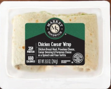 Plastic container with a pre-packaged Chicken Caesar Wrap from Easy Lunches' Sandwich Variety Pack, labeled as having 35g protein and 660 calories, weighing 8.6 oz (244g).