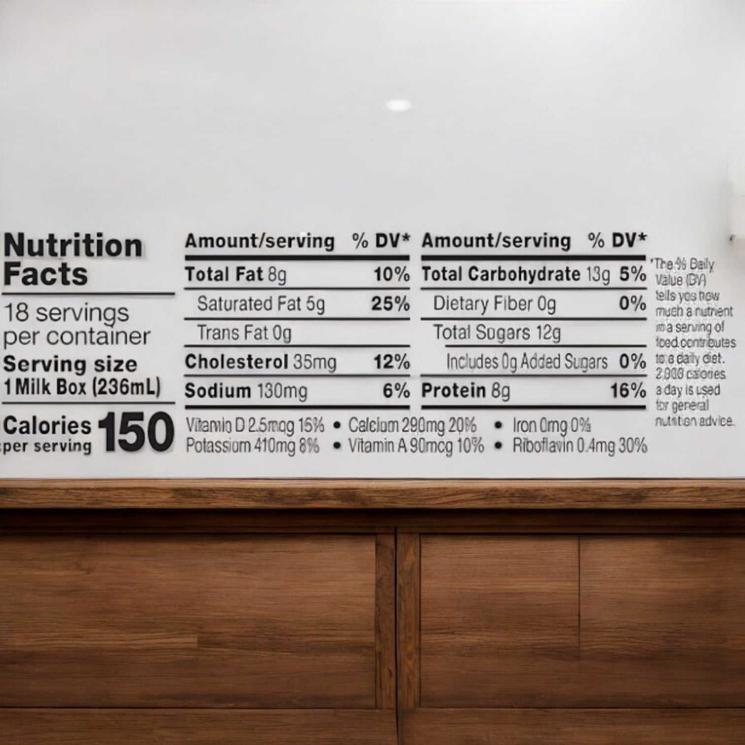 A close-up of the nutrition facts label for Easy Lunches' Organic Horizon Whole Milk & Chocolate Milk Bundle! 24 Total reveals that each serving (1 ml box or 236ml) contains 150 calories, along with detailed information on fat, cholesterol, sodium, carbohydrates, protein, vitamins, and minerals.