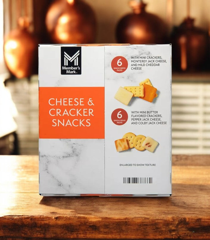 Box of Member's Mark Cheese and Cracker Snacks -12 Pack-1 Count, featuring protein-rich mini crackers with Monterey Jack, mild cheddar, and Colby Jack cheeses.