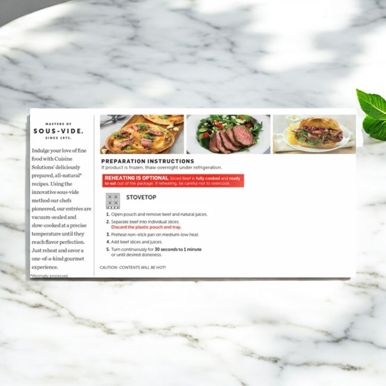 Packaging of Easy Lunches’ Cuisine Solutions Sliced Grass-Fed Beef Sirloin, 1-count on a marble surface, showing prepared dish images and stovetop or microwave reheating instructions.