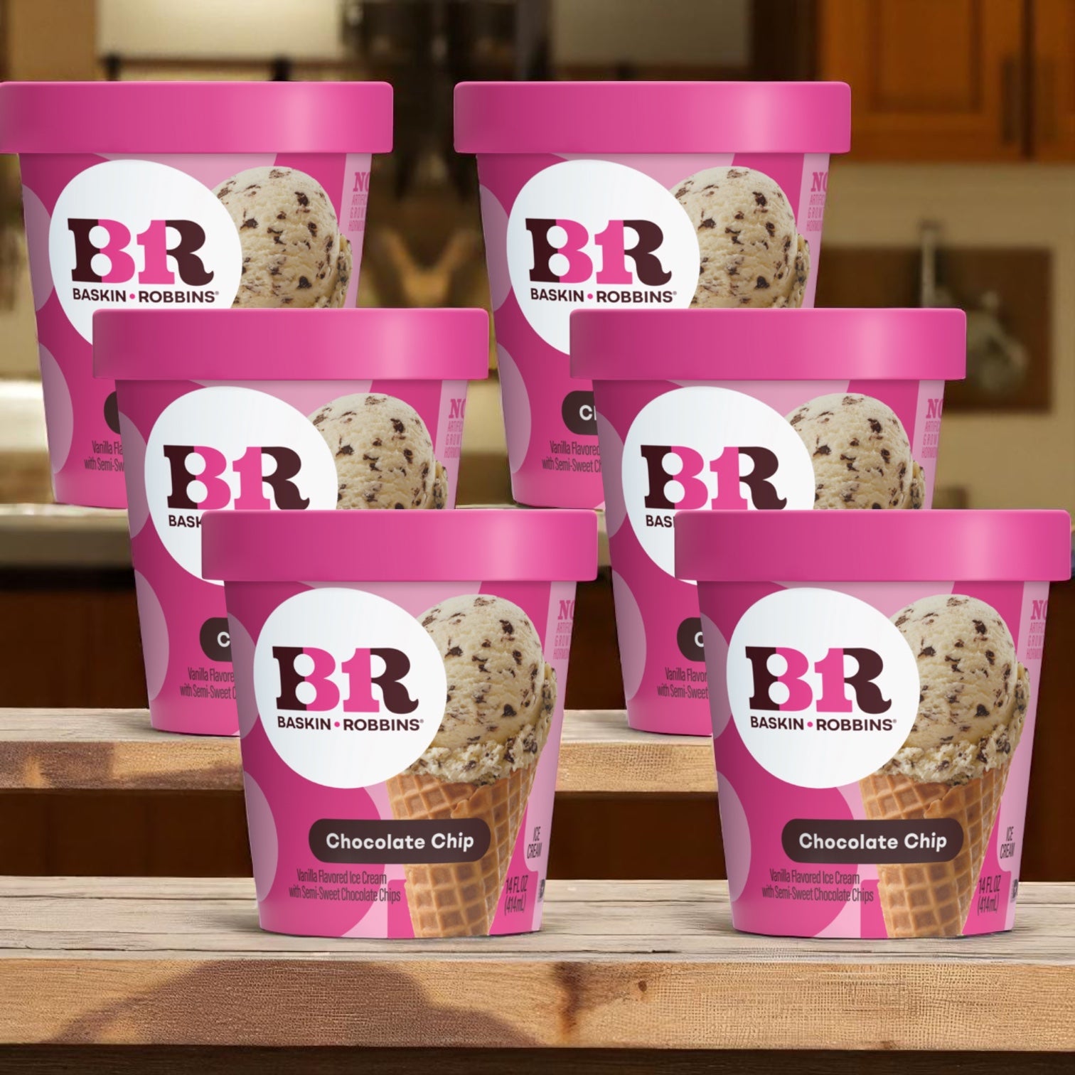 Six containers of Easy Lunches Baskin Robbins Ice Cream Chocolate Chip (14 oz each) are displayed on a wooden surface with a kitchen background.