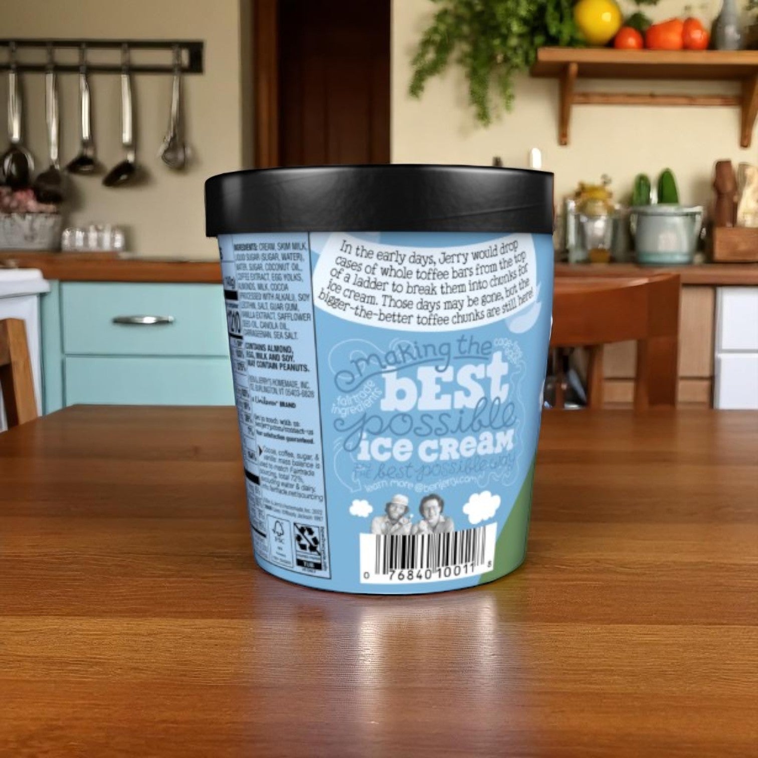 A 16 oz pint of Ben & Jerry’s Coffee Toffee Bar Crunch sits on a kitchen table, its signature blue label showcasing the brand’s premium appeal. (Pack: 6 cases).
