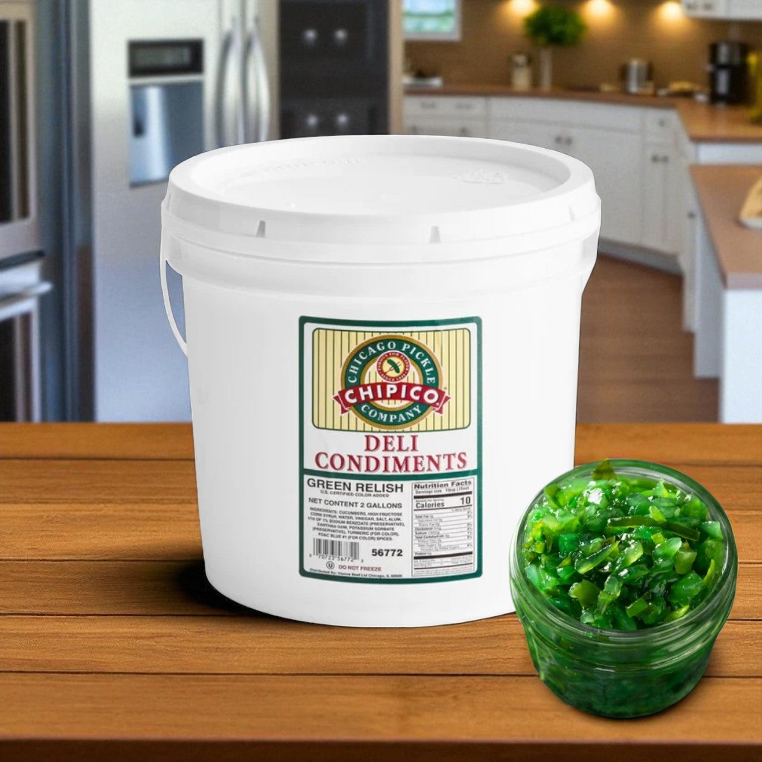 A large 2-gallon jar labeled "Vienna Beef Chipico Kosher Spears" sits on the counter beside a glass bowl of crisp pickle spears, perfect for topping an authentic Chicago hot dog or as classic foodservice pickles. Contains 160±10 spears.