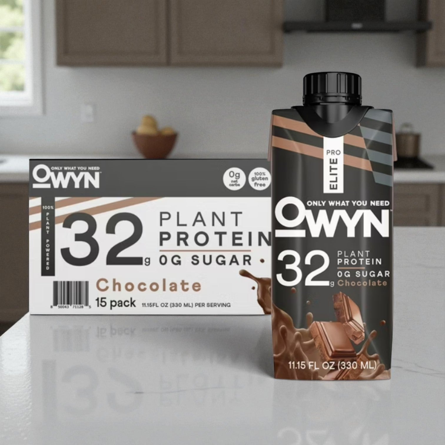 A case of Owyn Pro Elite 32g Keto Plant Protein Shake, Chocolate, 15-pack, with one shake up front on a kitchen counter—ideal as a vegan supplement.