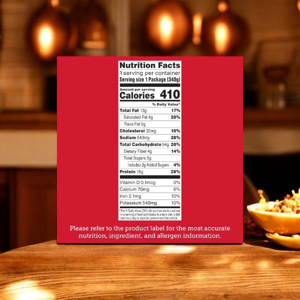 A nutrition label displays the caloric content, fat, cholesterol, sodium, carbohydrates, fiber, sugar, and protein per serving for Stouffer's Classics Spaghetti With Meat Sauce. Text advises to refer to the product label for accurate information.