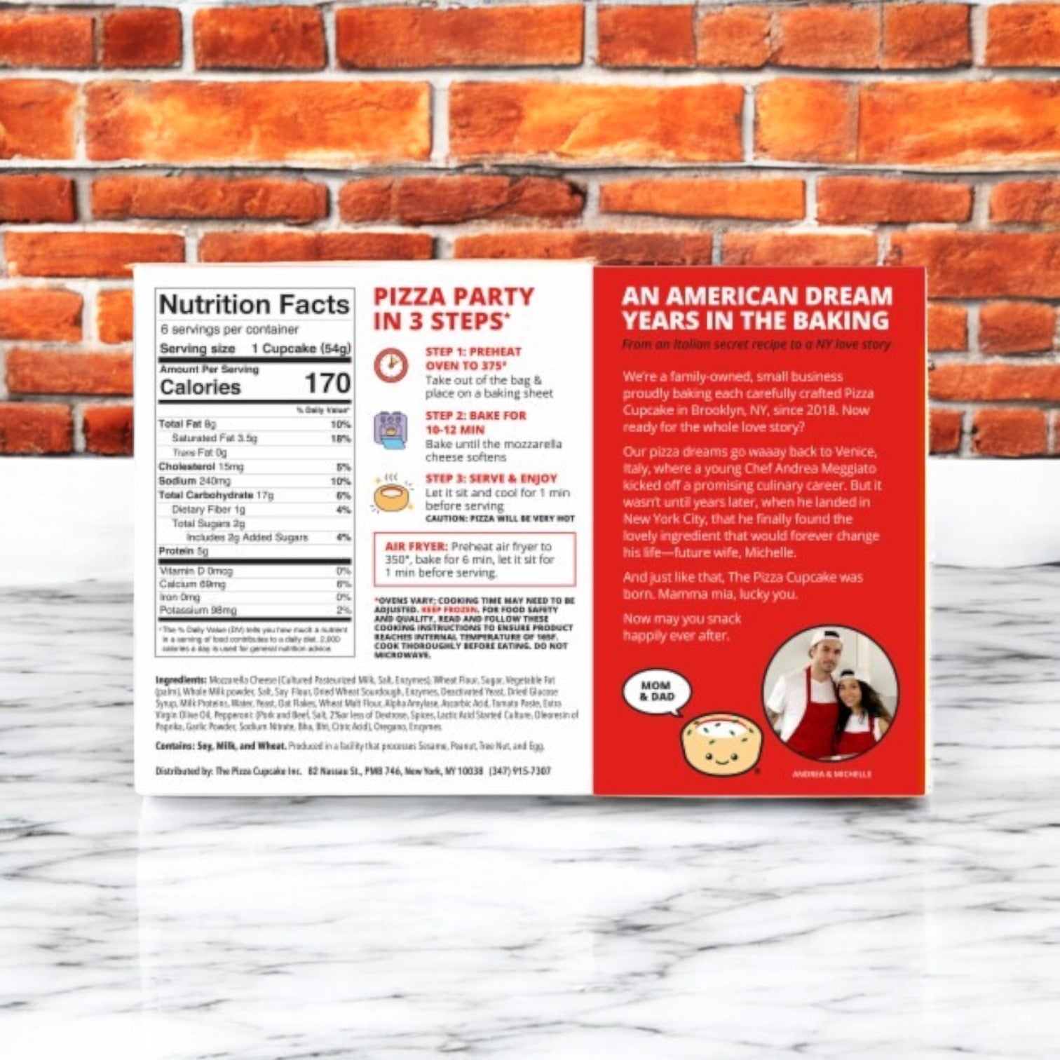 The Pizza Cupcake Pepperoni-1 Count, with nutrition facts, preparation steps, and a company story on the box, sits invitingly on a marble surface against a brick wall. Ideal for pepperoni enthusiasts craving an on-the-go snack by The Pizza Cupcake brand.