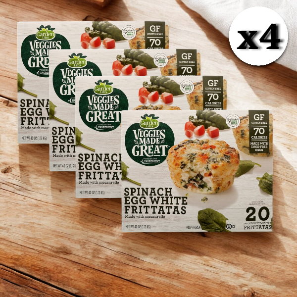 Four boxes of Garden Lites Vegetarian Spinach & Egg White Frittatas from the Veggies Made Great brand, each containing 20 vegetarian frittatas, arranged on a wooden surface. The packaging highlights their gluten-free status and 70 calories per serving. These frittatas are ideal for a high-protein breakfast.