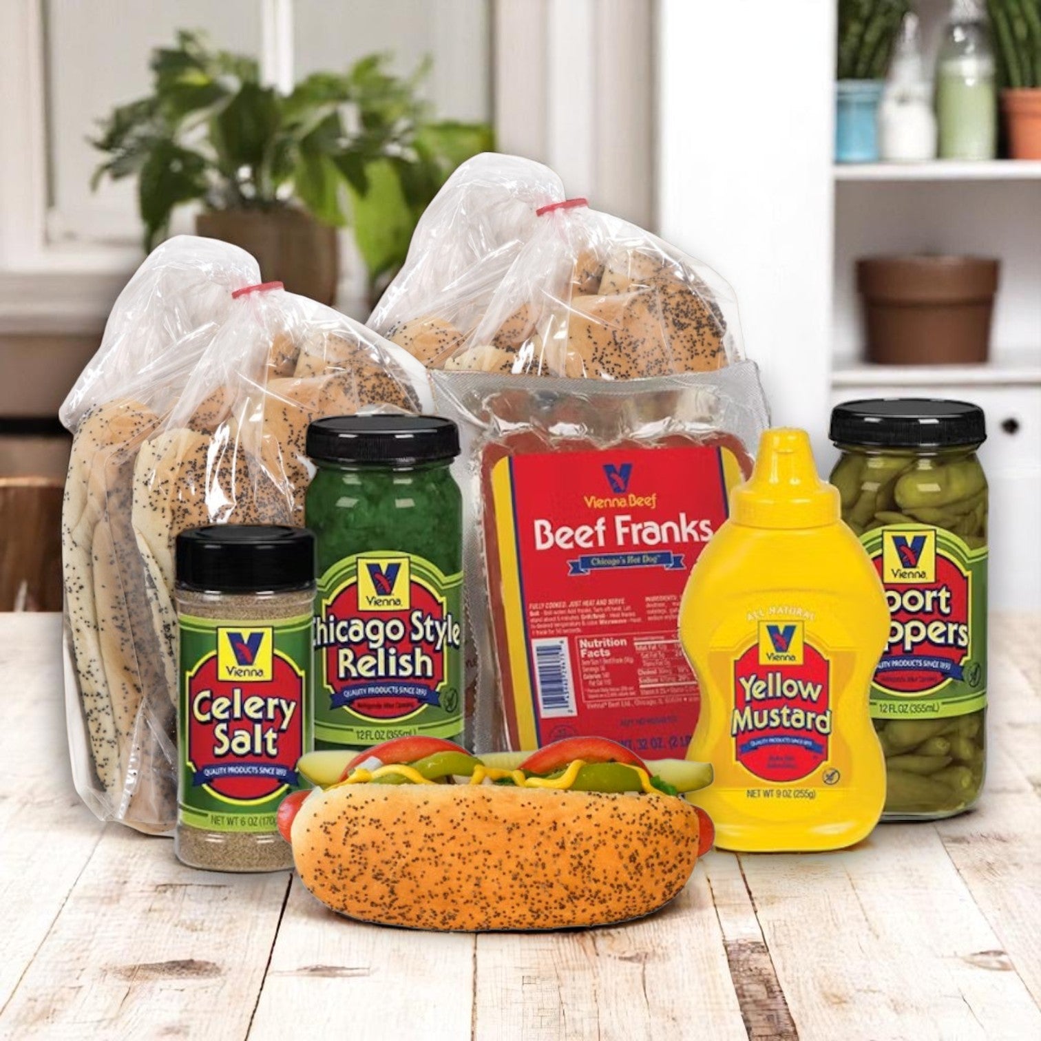 The Vienna Beef Chicago-Style Hot Dog Combo Pack – Serves 16 features juicy frankfurters in fresh buns, topped with mustard, relish, peppers, and classic condiments, all from the trusted Vienna Beef brand.
