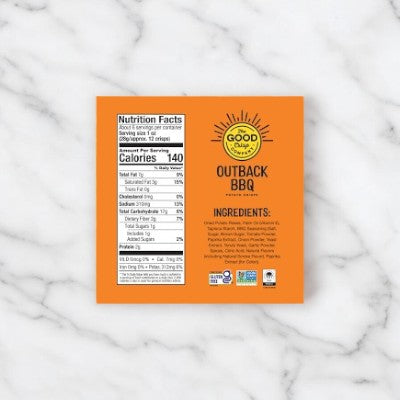 A bright orange food label titled "The Good Crisp Company Gluten Free Outback BBQ Snack Chips 5.6 oz Can" includes nutritional facts and a list of ingredients. The label also displays various certification logos.