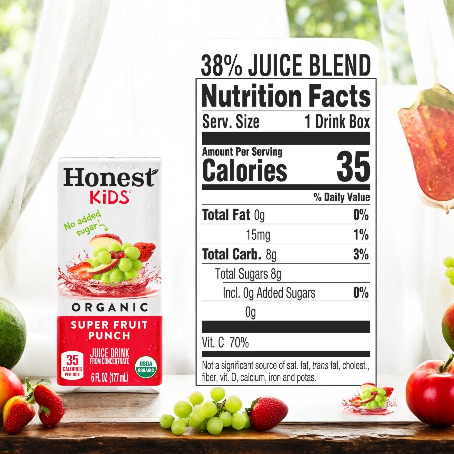 A carton of Honest Kids Organic Fruit Punch- 6 oz- 1 Count on a wooden table, displaying nutrition facts that include 35 calories per serving, 8g total carbs, 8g sugars, and providing 35% of the daily value for vitamin C. Enjoy the refreshing taste with no added sugar.