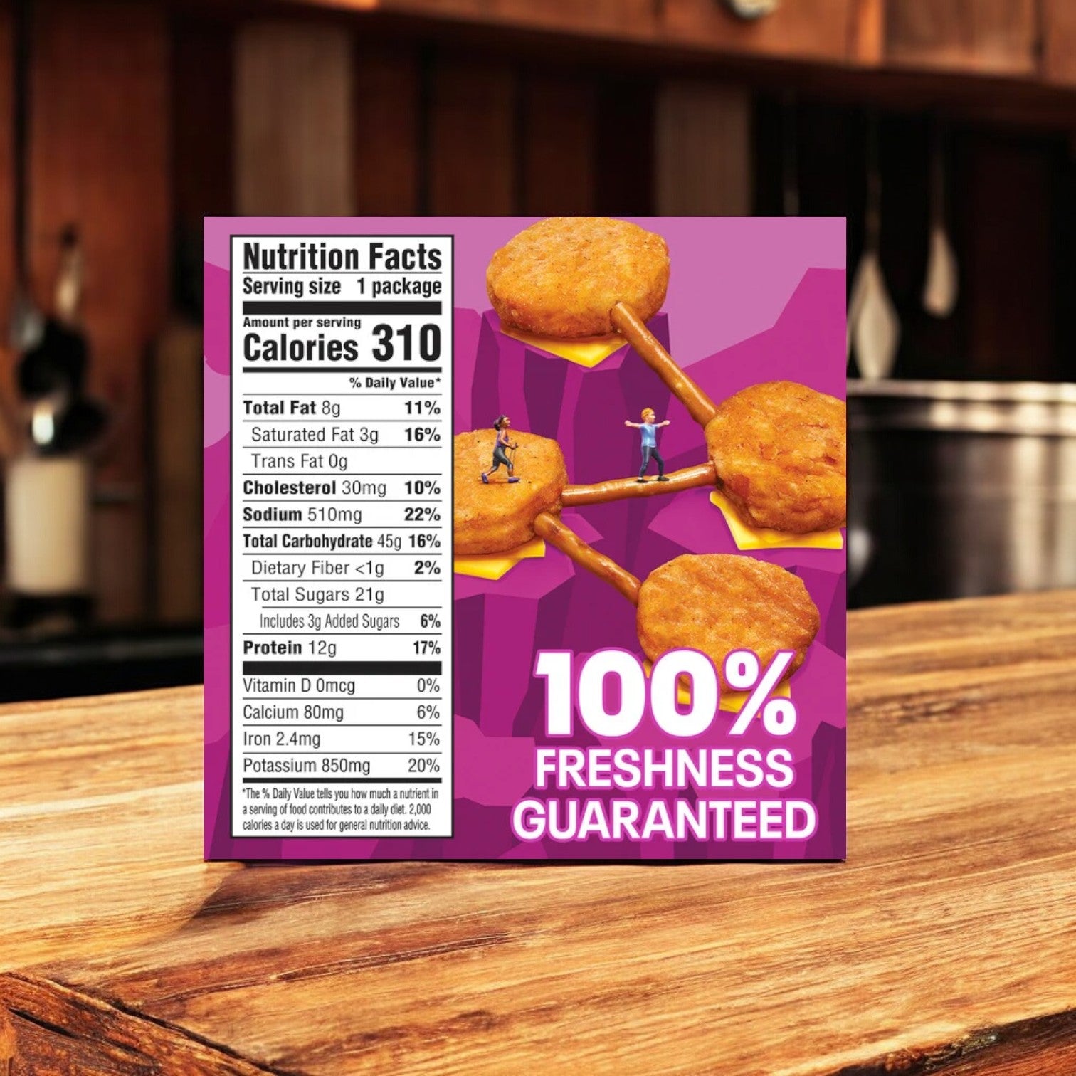 Image of a Lunchables Chicken Nugget Kabobbles, 9 oz. - 5 Pack package on a wooden surface. The package features nutrition facts and four Chicken Nugget Kabobbles connected by wooden sticks, with text reading "100% Freshness Guaranteed." Perfect for an on-the-go snack or convenient meal.