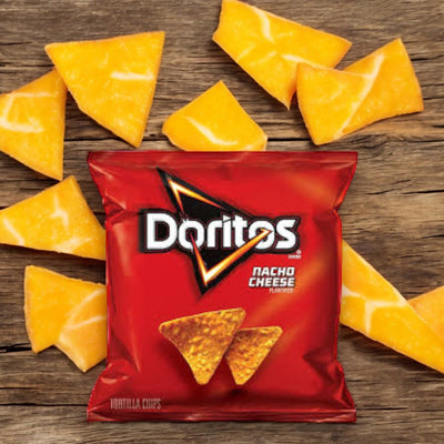 A red bag of Frito Lay's Doritos Nacho Cheese 1 oz, ideal for on-the-go snacking, is displayed on a wooden surface, surrounded by triangular pieces of cheese.