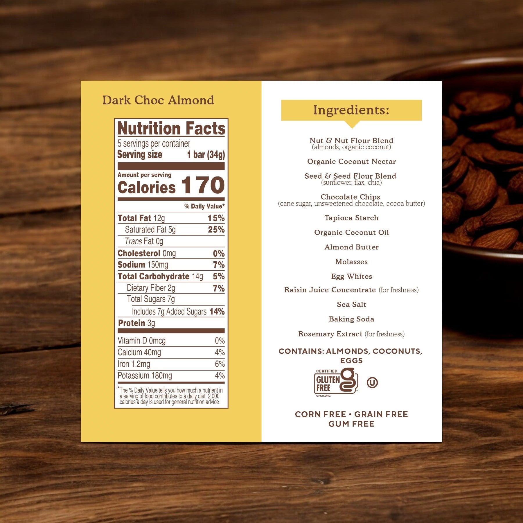 A nutrition facts label and ingredients list for Simple Mills Soft Baked Almond Flour Bars. The gluten-free label highlights 170 calories per bar, with ingredients including a nut flour blend, almond butter, and organic chocolate chips.