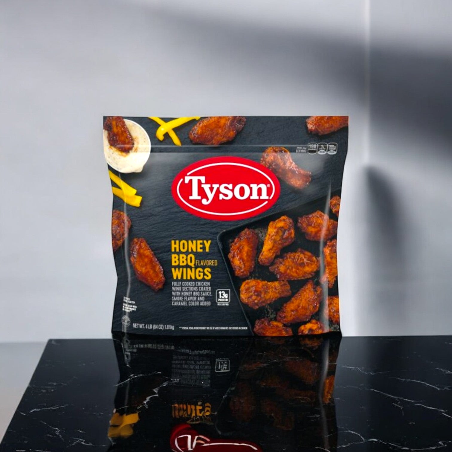 Image of four bags of Tyson Honey BBQ Flavored Wings, 64 oz., neatly arranged against a marble background. A black circle graphic in the bottom left corner displays "x4," emphasizing the irresistible smoky flavor of these Tyson chicken wings.