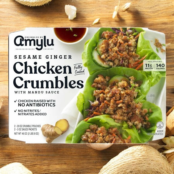 Experience the delicious and healthier option of Amylu Sesame Ginger Chicken Crumbles, available in a 46 oz package and including lettuce wraps and Mandu sauce. Made by Amylu with 'no antibiotics' and 'all-natural ingredients', this fully cooked product offers 11g of protein per serving, while containing just 140 calories.