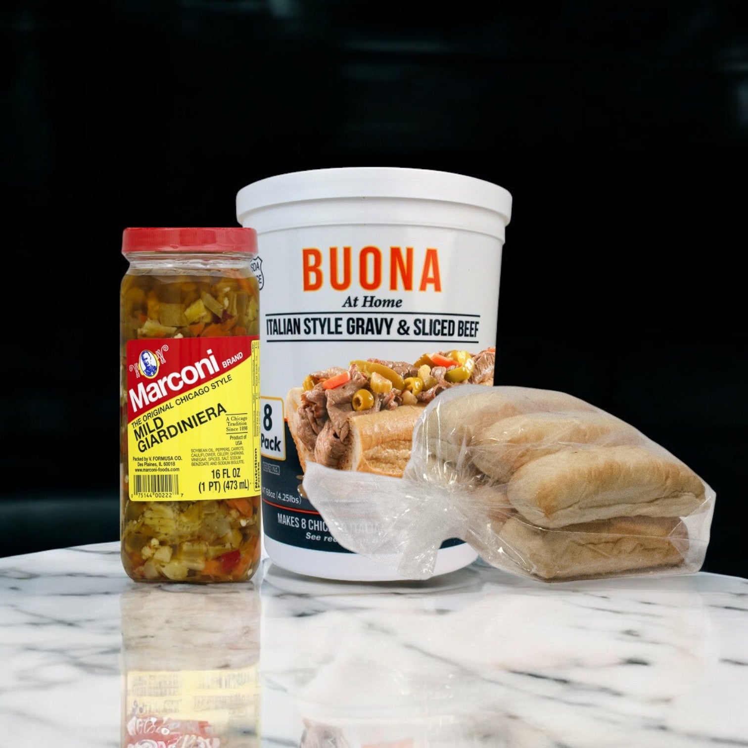 An 8-pack kit of Easy Lunches' Buona Beef, including a jar of Marconi mild giardiniera and packaged rolls, is displayed on a marble surface.