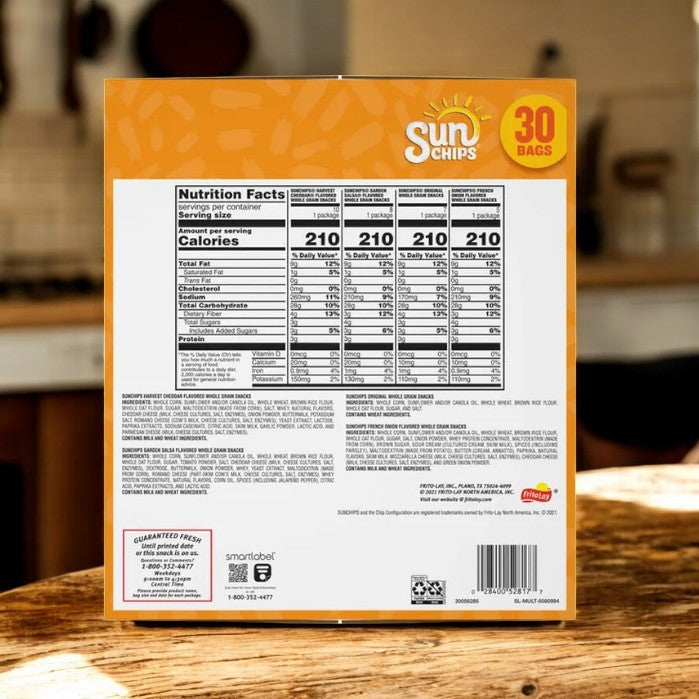 In a kitchen setting, a Sun Chips Variety Pack highlights nutritional facts with 90 bags total (3 boxes of 30), each offering whole grain chips in individually packaged bags for freshness and convenience.