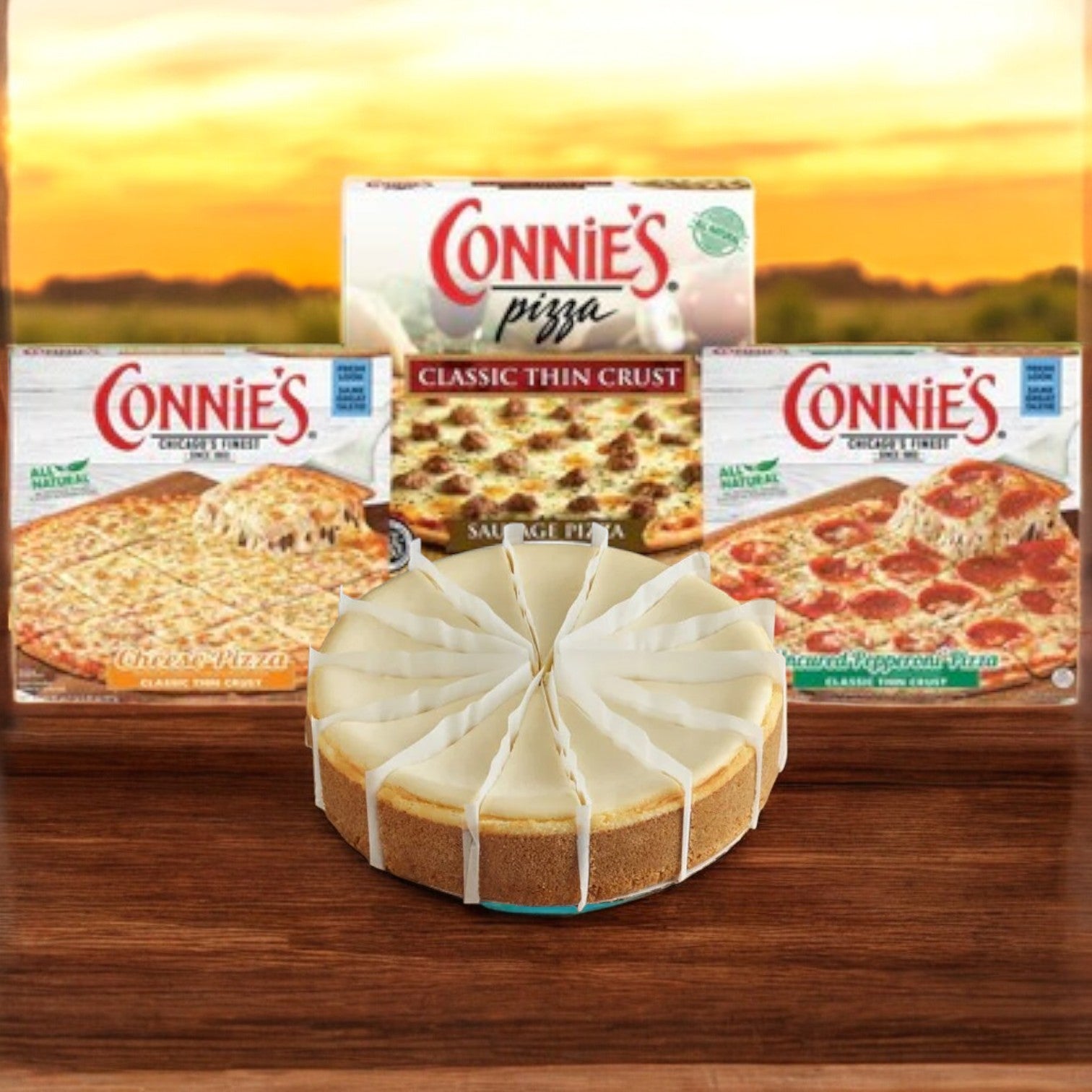 The Connie's Bundle! from Easy Lunches, featuring three thin crust pizzas and a cheesecake, is displayed against a sunset backdrop.