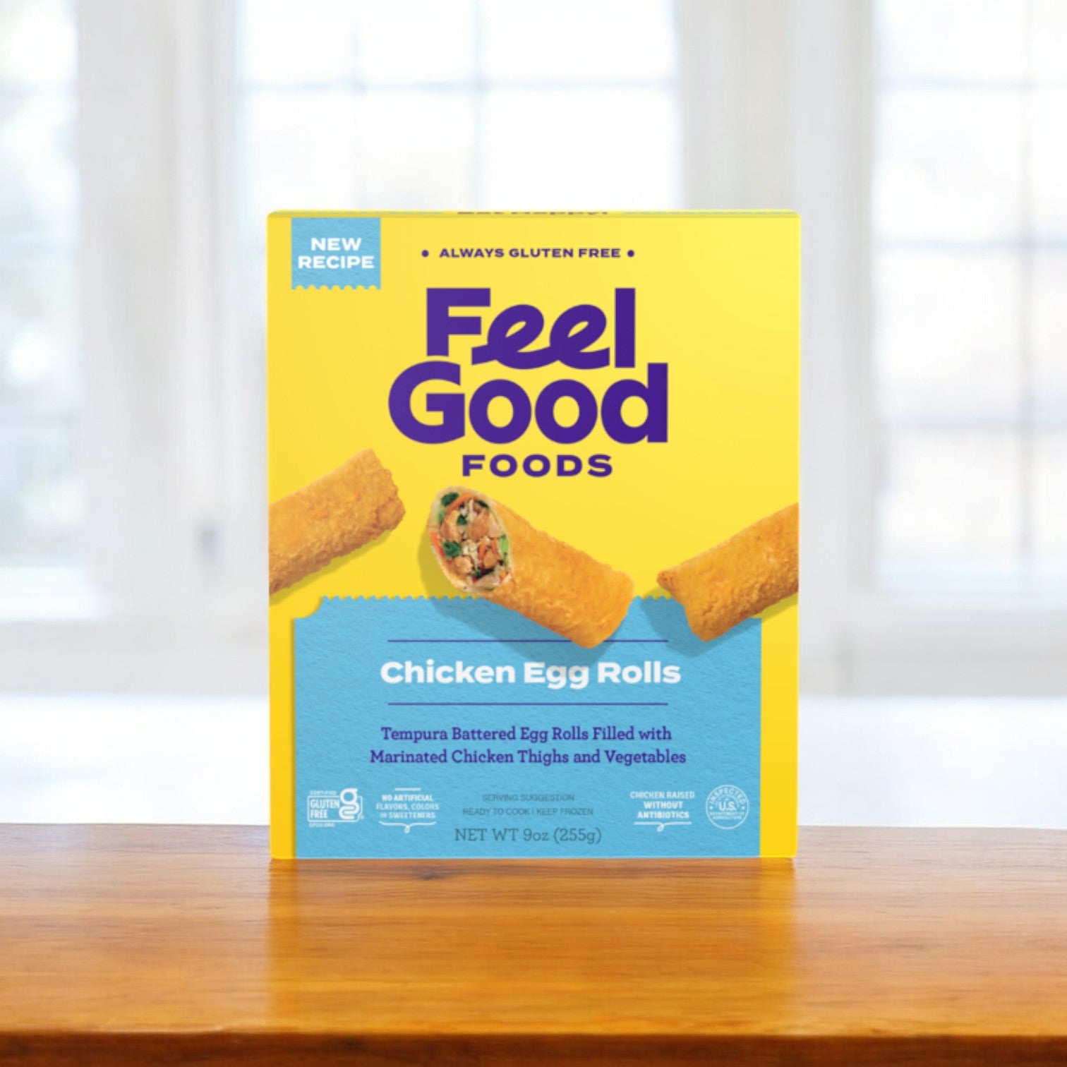 The Feel Good Foods Gluten-Free Chicken Egg Rolls, 9 oz. - 1 Count, provide a convenient and simple meal option featuring a crispy shell. These egg rolls are tempura-battered and filled with marinated chicken thighs and vegetables, with their gluten-free status prominently displayed on the package.