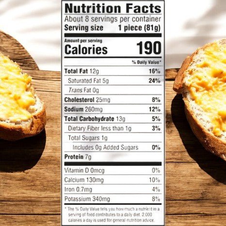 The TGIF Fridays Loaded Cheddar & Bacon Potato Skins Value Size Frozen Snacks have a nutrition label detailing 190 calories per serving, with 12g fat, 25mg cholesterol, 260mg sodium, 33g carbs, and 7g protein. Two slices of bread topped with cheddar cheese spread are shown.