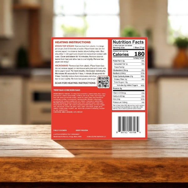 The back of a Wow Bao Teriyaki Chicken Bao-4 Count-3 Boxes package features heating instructions, nutritional facts, and a barcode. Placed on a wooden table in an inviting kitchen, this Asian-inspired snack delivers a delicious fusion of flavors in every steamed bun.