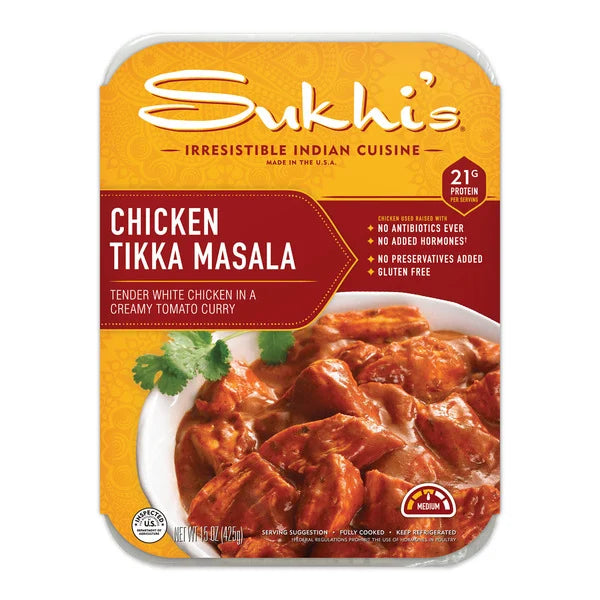 Sukhi's Chicken Tikka Masala, 15 oz. - 1 Count, delivers the authentic taste of Indian cuisine with tender white chicken enveloped in a creamy tomato curry. It boasts 21g of protein and is both gluten-free and free from added hormones or antibiotics. Enjoy its medium spice level for a delightful culinary experience.